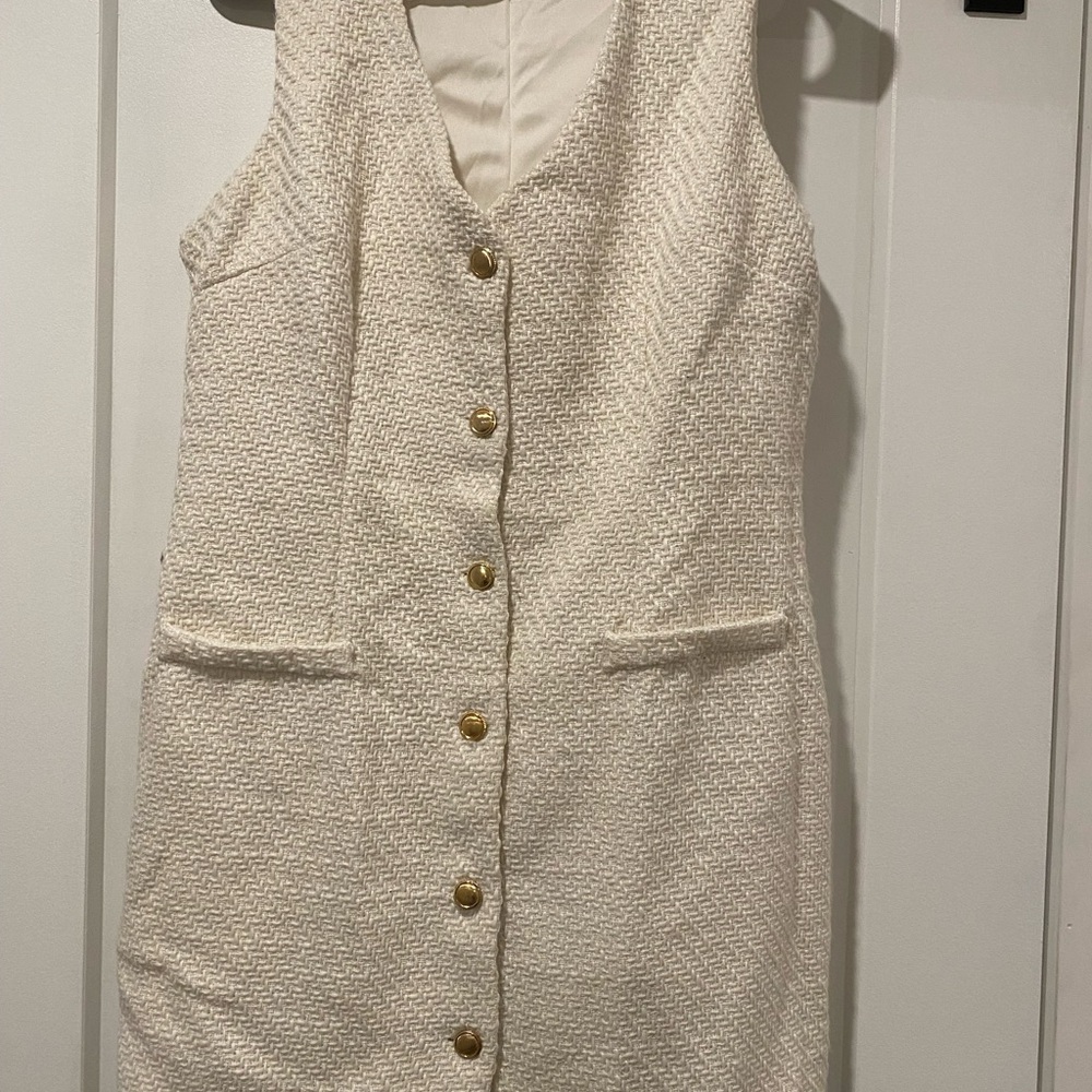 Elegant Cream Sleeveless Dress with Gold Buttons